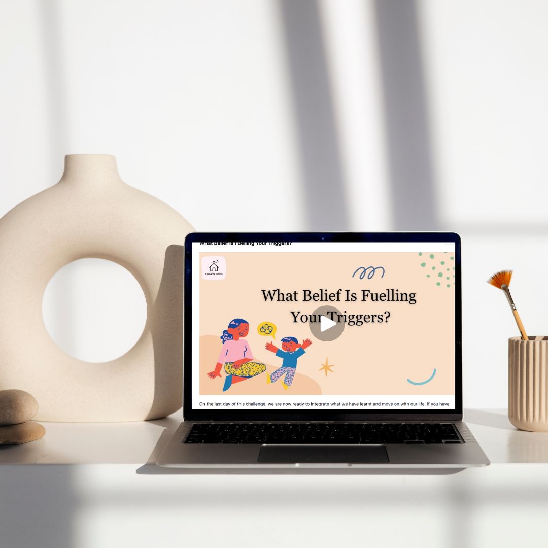 A laptop with a video from The Empowered Parenting 5-Day Challenge from The Caring Instinct